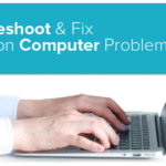 A frustrated person looking at a slow computer with a spinning hourglass icon on the screen, illustrating a common computer problem