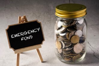 All images in the blog post would have descriptive alt text, such as "A piggy bank labeled 'Emergency Fund' being filled with coins" or "A diagram showing the difference between a checking account and a high-yield savings account for an emergency fund.