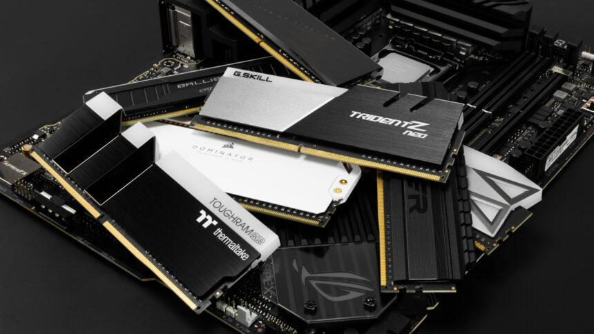 A glowing stick of high-performance DDR5 RAM held in front of a vibrant, out-of-focus gaming PC background, illustrating the importance of RAM for gaming in 2025.
