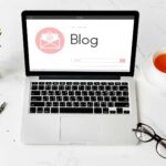 writer crafting an SEO-friendly blog post with keyword research concepts visualized.