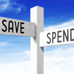 A balanced scale with "Saving" on one side and "Spending" on the other, symbolizing financial equilibrium.